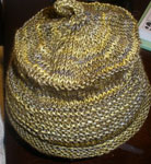Hand knit garter stitch hat/cap knit with Malabrigo Merino Sock Yarn color tur