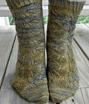 Hand knit socks knit with Malabrigo Merino Sock Yarn color turner