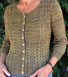 Hand knit cabled cardigan sweater knit with Malabrigo Merino Sock Yarn color turner