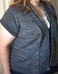 Malabrigo Sock Yarn color zarzamora knit short sleeve cardigan