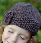 Malabrigo Worsted Merino Yarn color pearl ten, hand knit child's hat